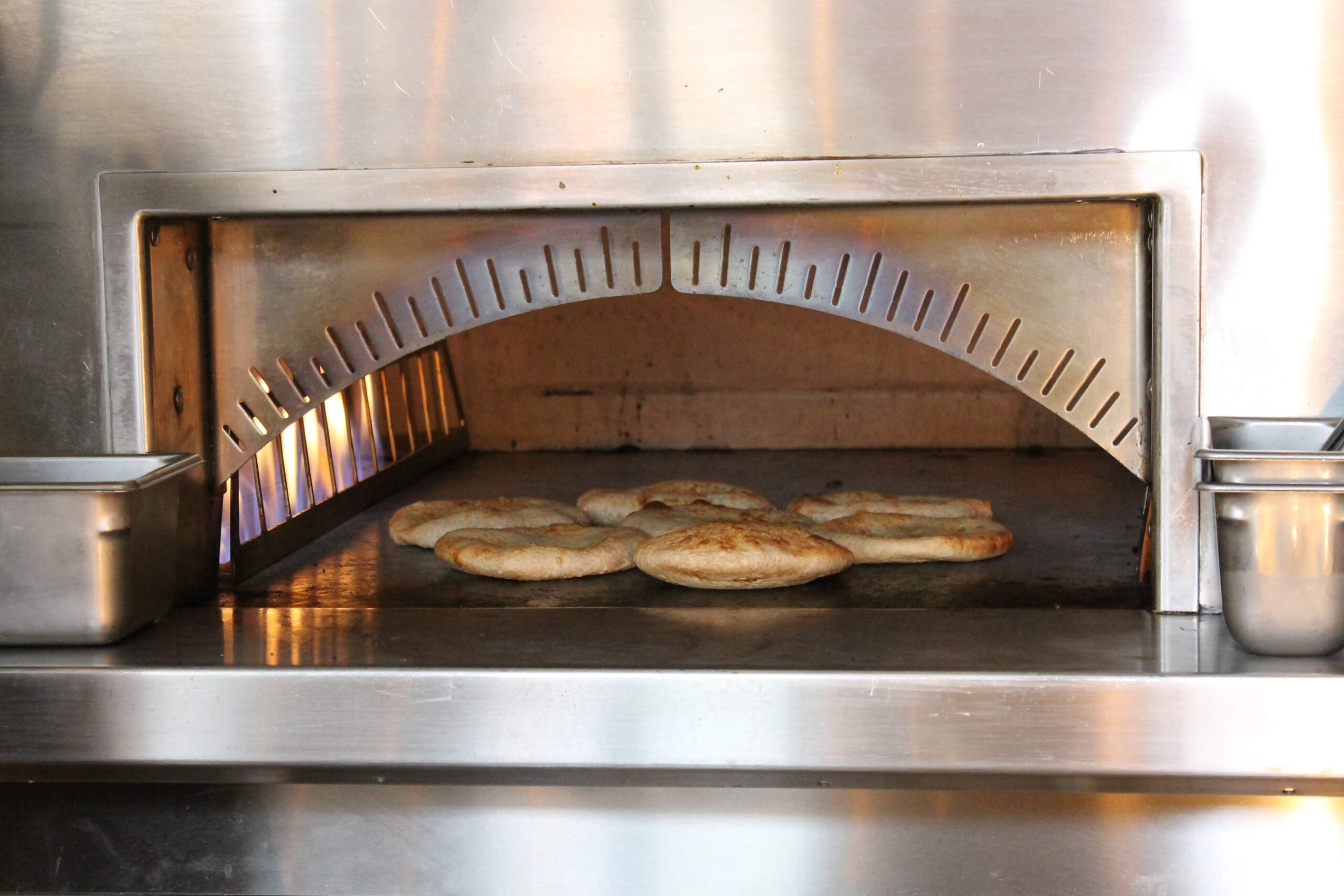 Baking Pita (Photo by Photos courtesy of Brassica)