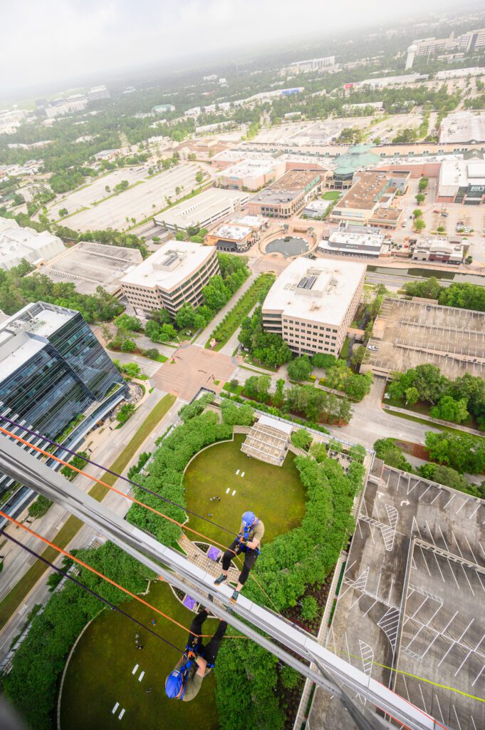 The dizzying view from the top of the tower at Camp For All’s Over the Edge fundraiser at The Woodlands Towers on The Woodlands Waterway. (Photo by Si Vo Photography)