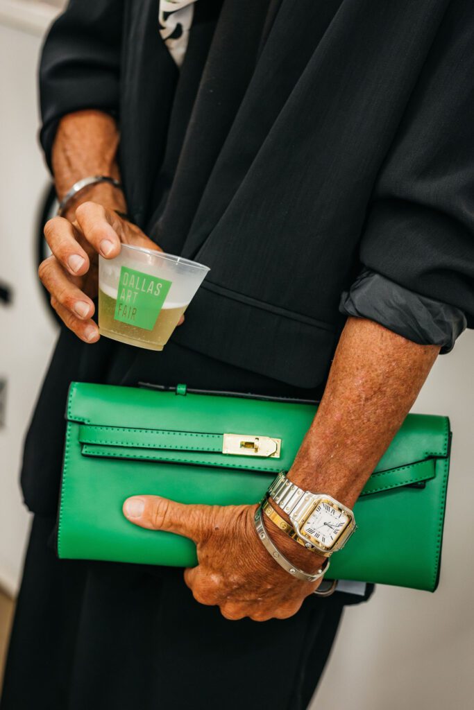 Curators, collectors, gallerists, artists, admirers, and aspirationalists flock to Fashion Industry Gallery (a.k.a. FIG) for a night downtown that's chock full of air kisses and red dots. (Photo by Chase Hall)