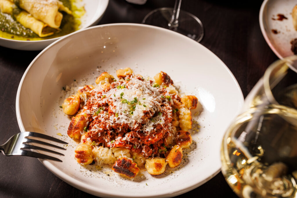Trattoria Bugatti's menu will offer pasta, pizza, steak, and so much more. (Photo by Samantha Marie Photography)