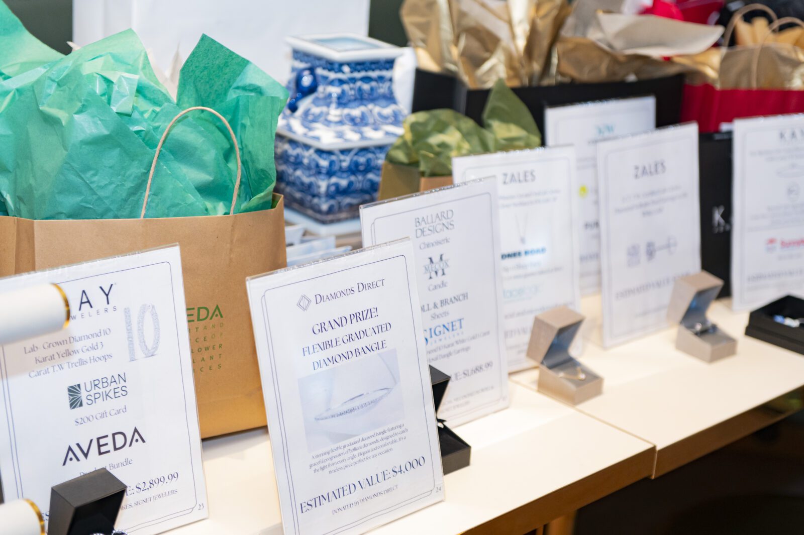 Guests were able to enter into a raffle for over 20 items, including a grand prize diamond bangle from Diamonds Direct. (Photo by Tamytha Cameron Photography)