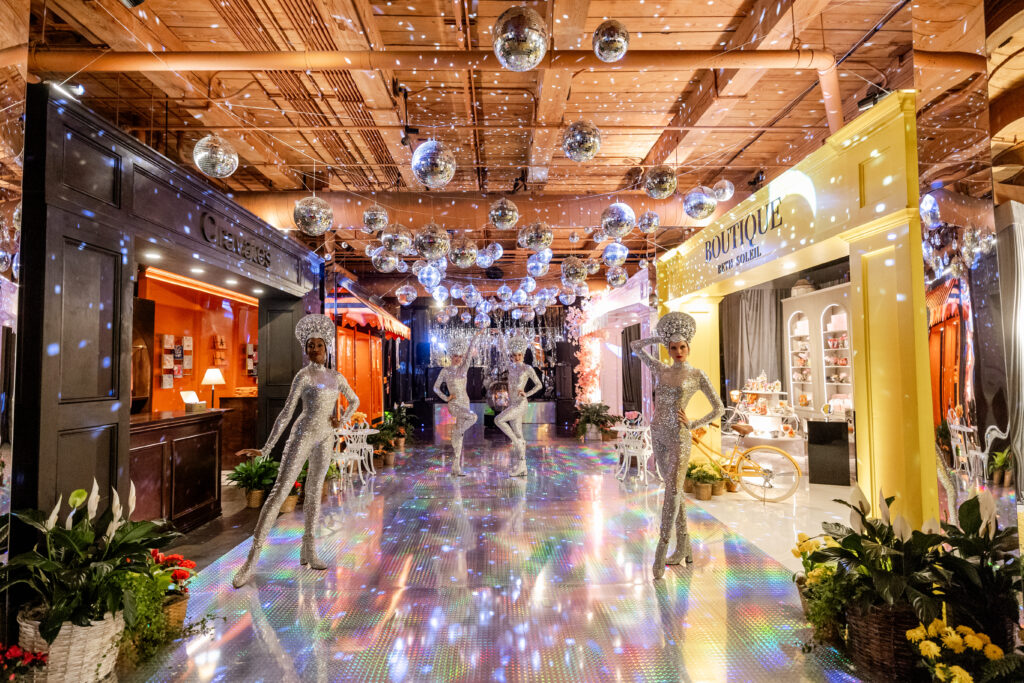 New York City-based, global event planner, JoAnn Gregoli, transformed into both Studio 54 AND the streets of Paris. (Photo by Anastasiia Photography)