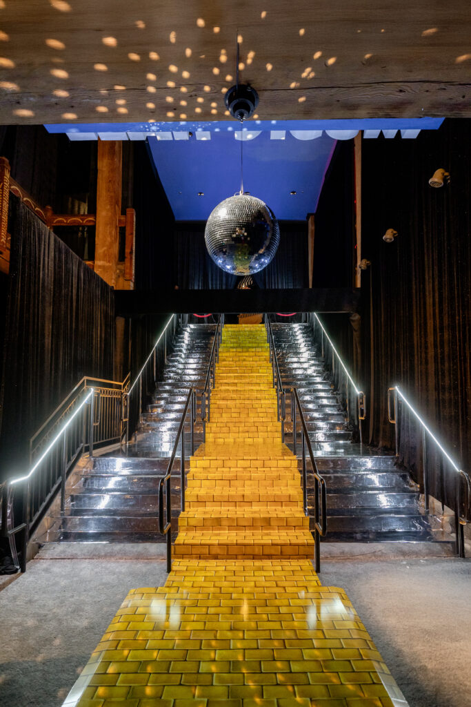An epic surprise awaited guests at the bottom of the staircase. (Photo by Anastasiia Photography)