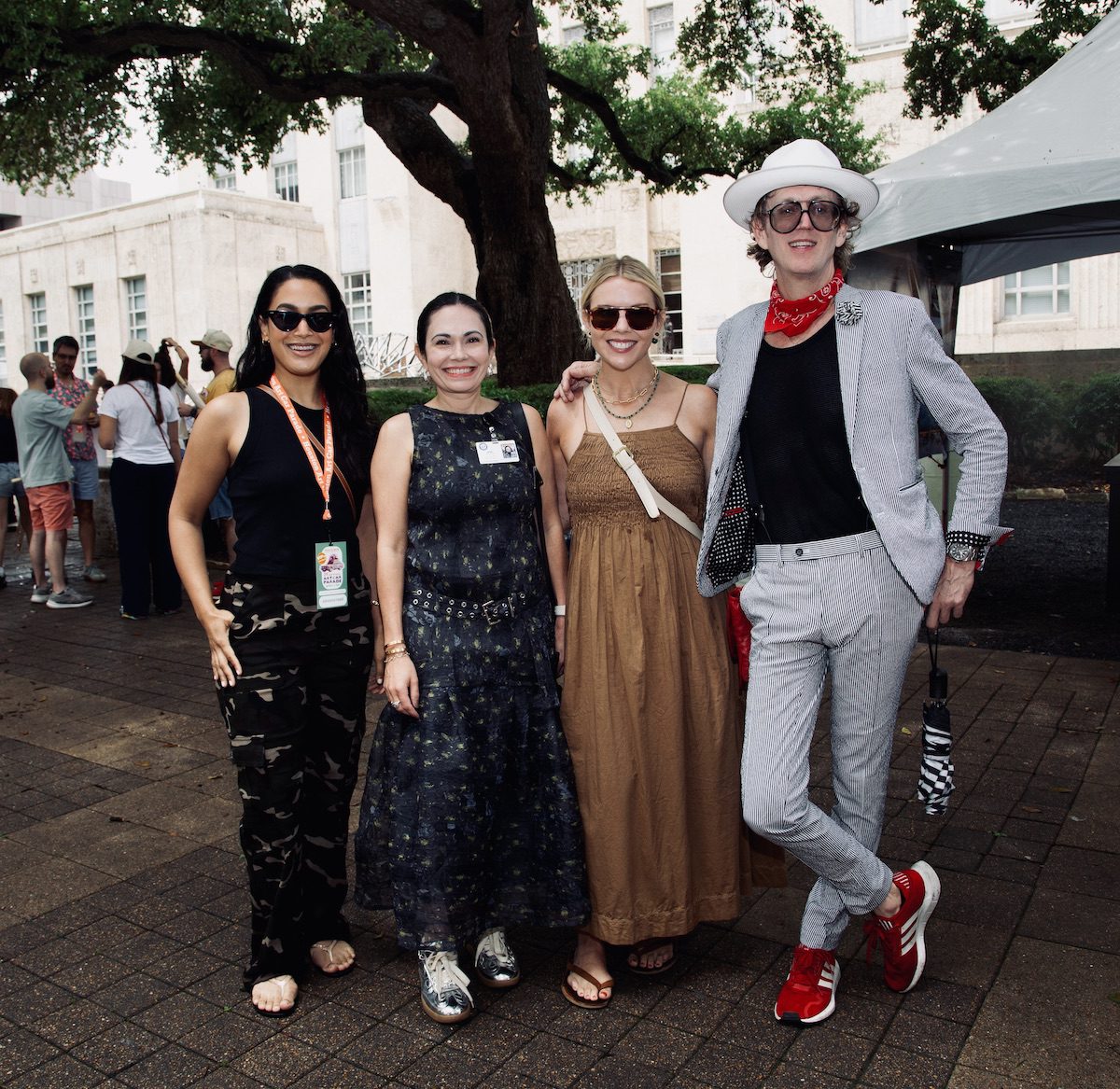 Elizabeth Martin, Michele Leal, emcees Piper Faust and Alton DuLaney at the Orange Show’s 39th Annual Art Car Parade. (Photo by Mike Herrera)