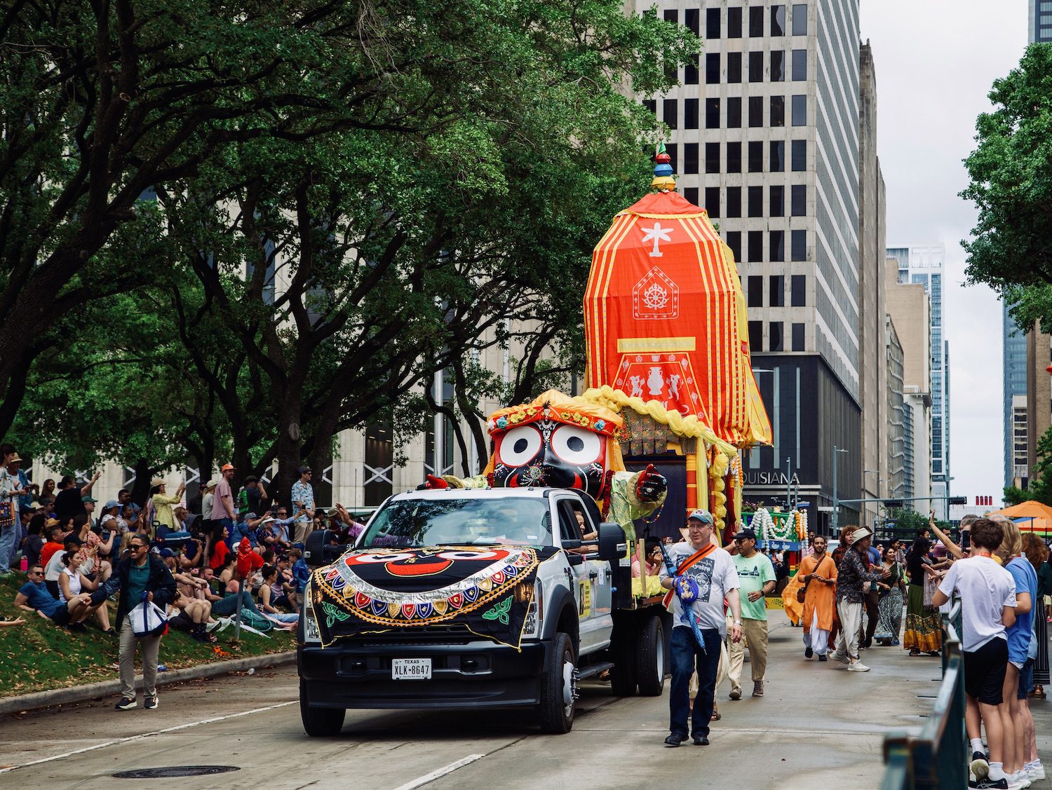 "Hare Krishna Chanters" by Hare Krishnas at the Orange Show's 39th Annual Art Car Parade. (Photo by Mike Herrera)