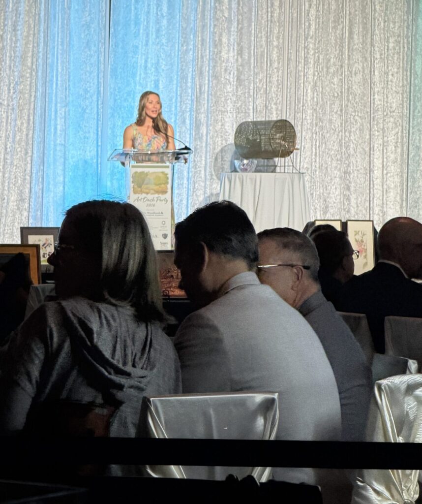 Haley Garcia, President of the Board of Directors for The Woodlands Arts Council, welcomed guests to the Art Dash party. (Photo by Laura Landsbaum)