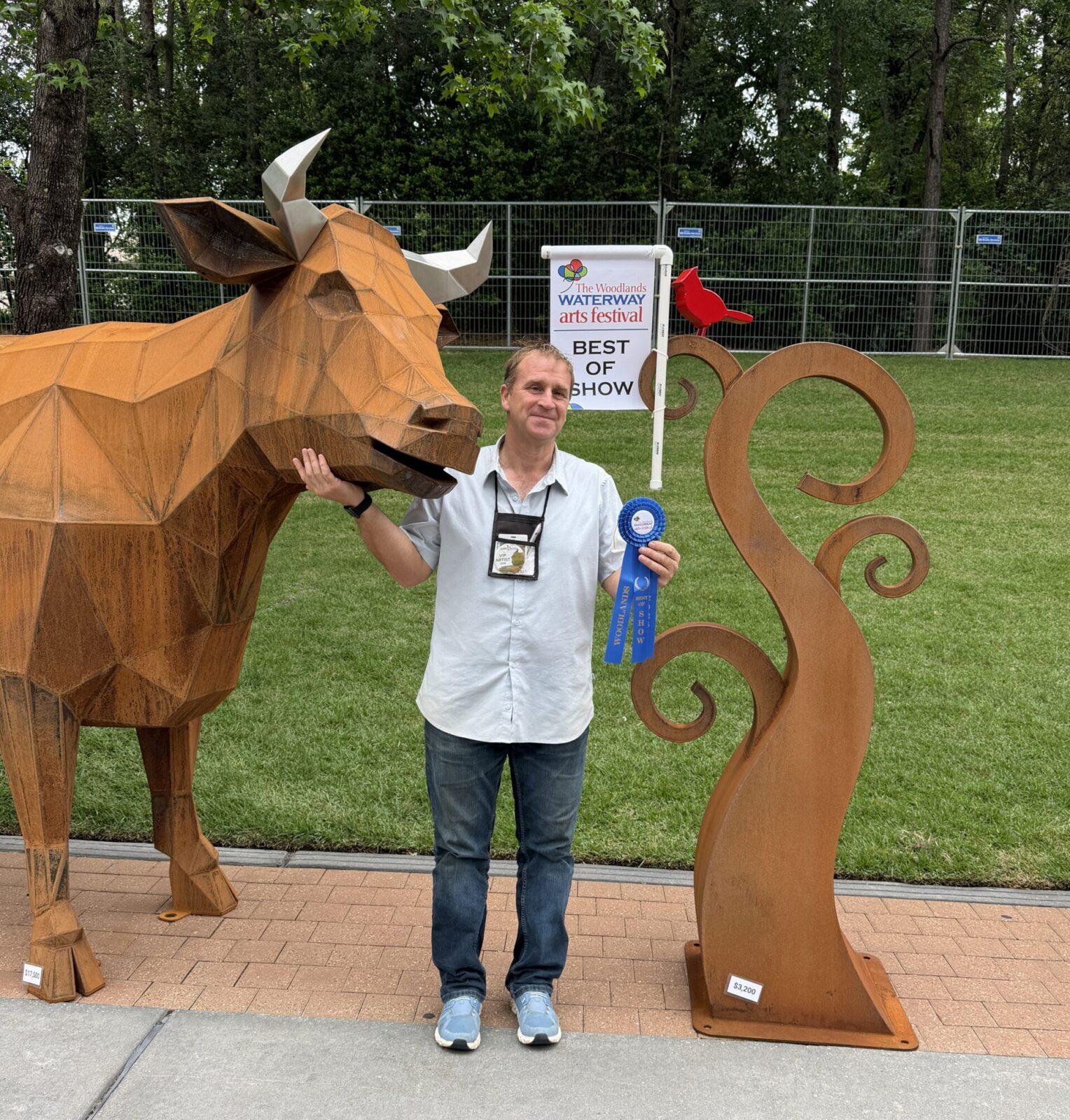 Dale Rogers, a sculptor from Massachusetts, won Best of Show in Sculpture & Metalworks at the 2026 Woodlands Waterway Arts Festival. (Photo by Laura Landsbaum)