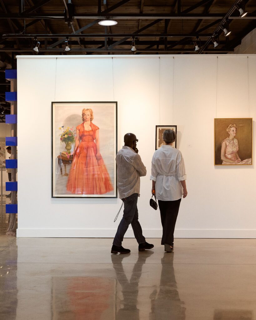 The exhibition featured 17 found portraits. (Photo by Heather Halbert)