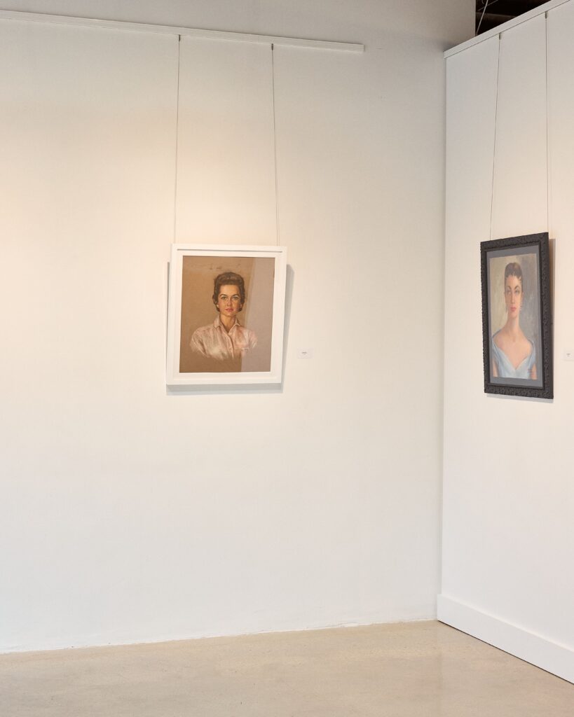 James Williams at J Williams Fine Art professionally installed the portraits in his gallery. (Photo by Heather Halbert)