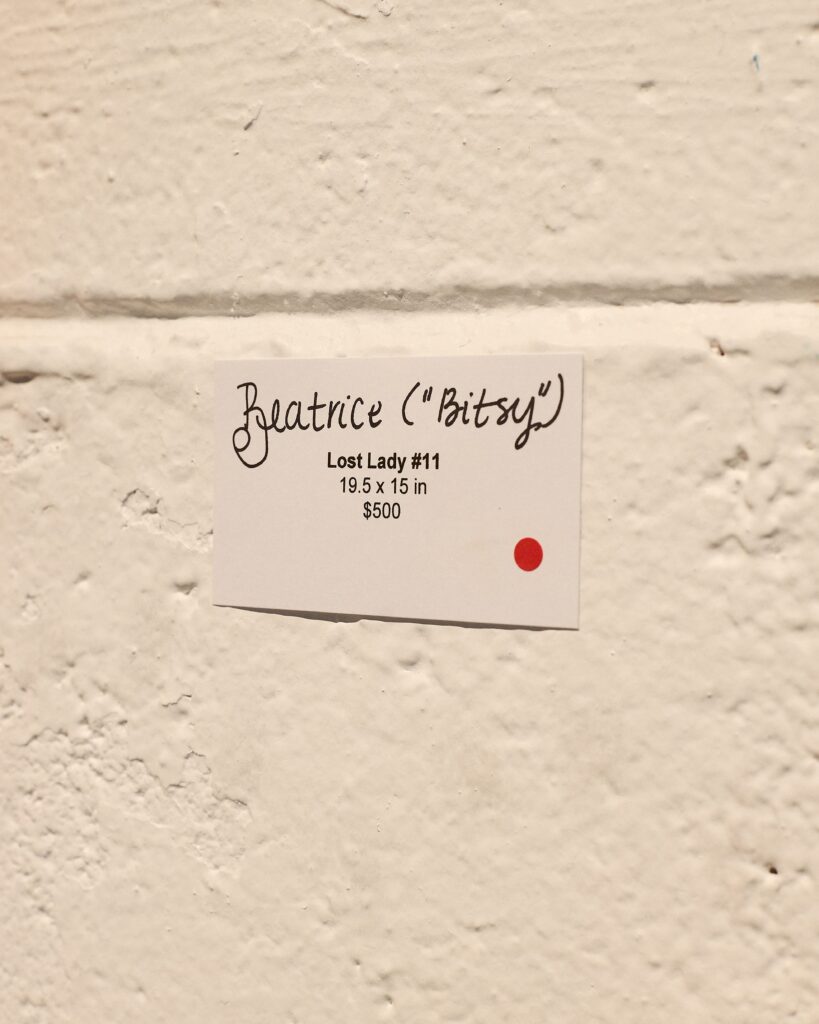 15 of the 17 potraits sold at the reception. (Photo by Heather Halbert)