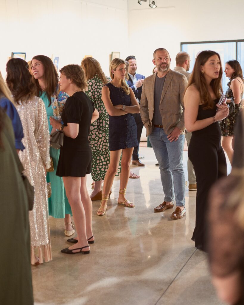 On a recent bustling Dallas night, more than 125 thrifters, art lovers, and vintage enthusiasts gathered at J Williams Fine Art for the one-night-only exhibition of found portraits. (Photo by Heather Halbert)
