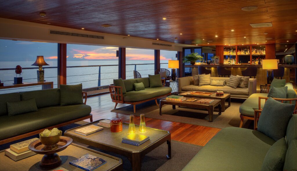 The 205-foot Aqua Mekong accommodates up to 40 guests across 20 suites, with a 1-to-1 crew-to-guest ratio that shapes the experience from the moment you step aboard. (photo courtesy of Aqua Expeditions)