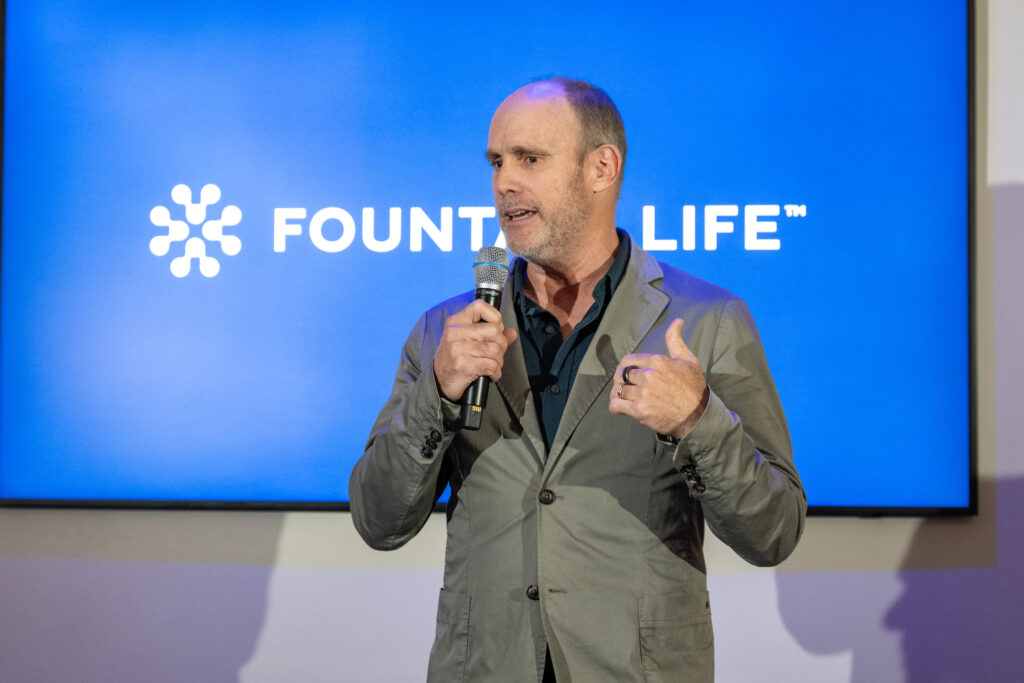 Park House co-founder John Scott addresses guests at the Fountain Life opening in Houston's Park House (Photo by Jacob Power)