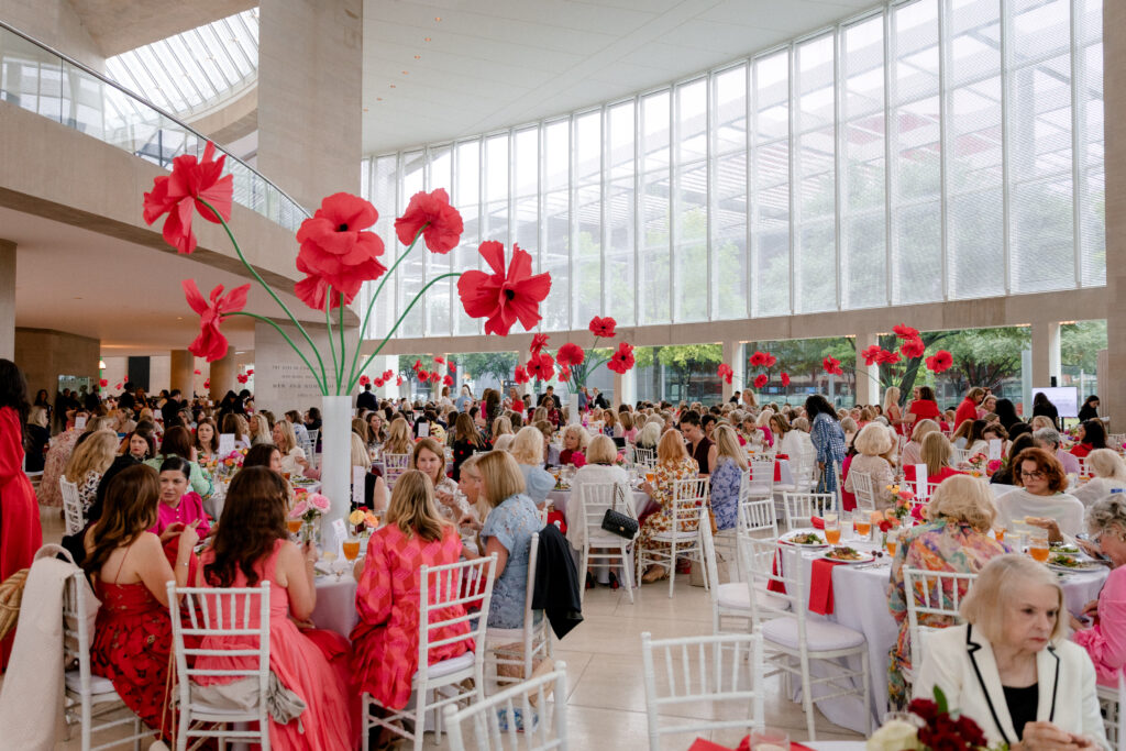 Magnificent poppies were incorporated into the tablescape. (Photo by The Salvation Army of North Texas)