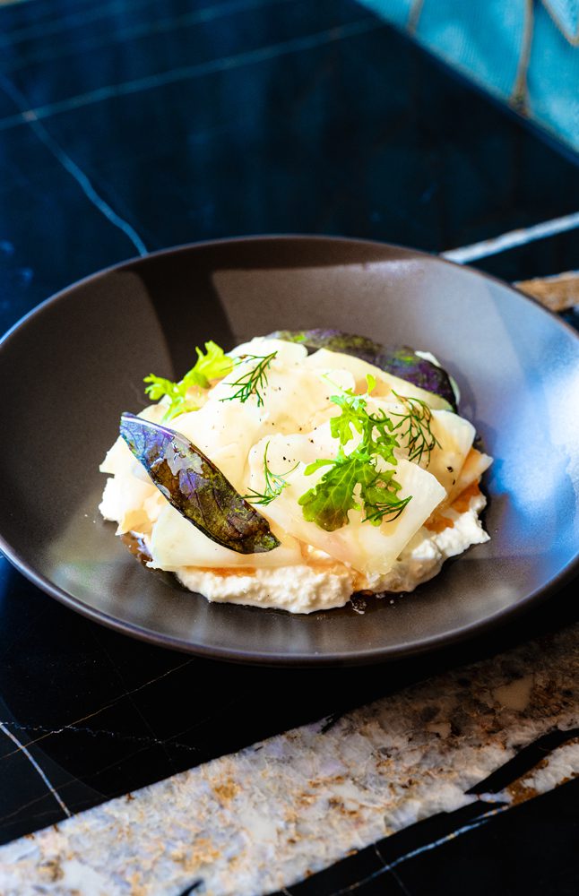 Chef Alvarado's salt crusted kohlrabi with Stracciatella cheese and oli santo ($18) is an Osteria di Mercato standout.
