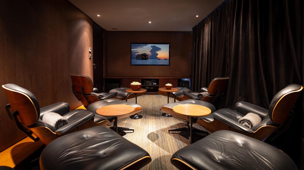 Aqua Mekong has an eight-seat screening room outfitted with Eames chairs, where guests can book private film screenings at any time, served with popcorn and the ship's house made ice cream. (photo courtesy of Aqua Expeditions)