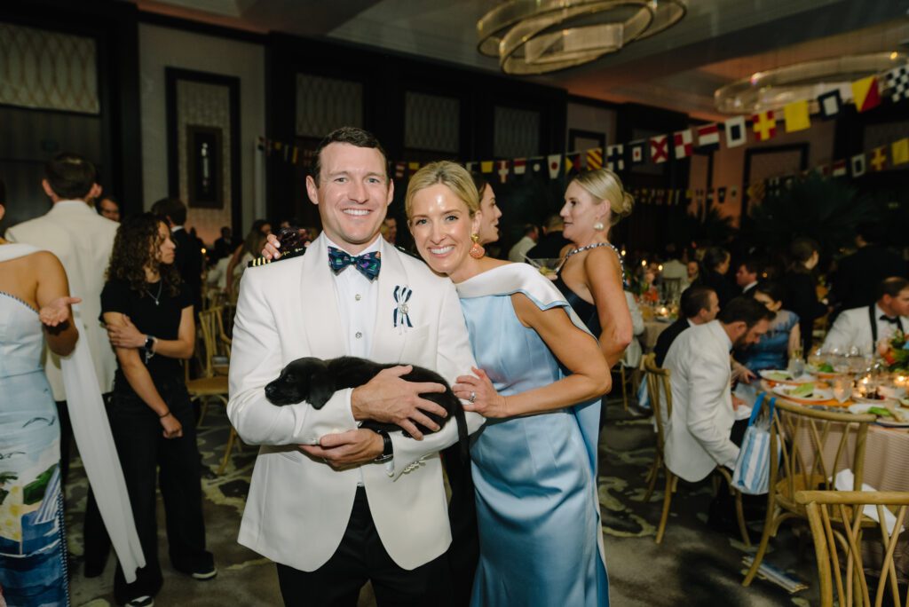 Rich & Jenny Tompkins with auction puppy, Sailor, at the Children's Fund 'By the Sea' gala