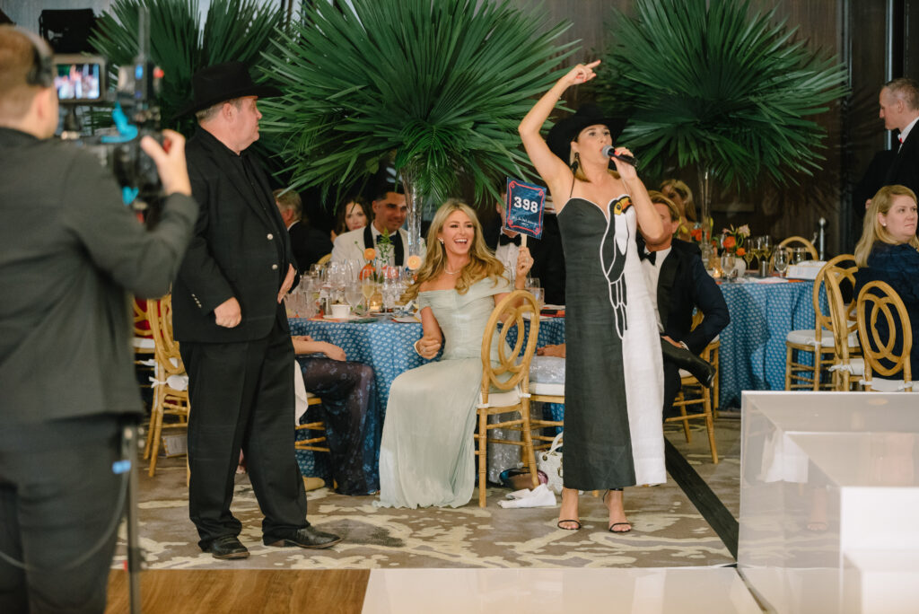 McKenzie Reitz in auction action at the Children's Fund 'By the Sea' gala