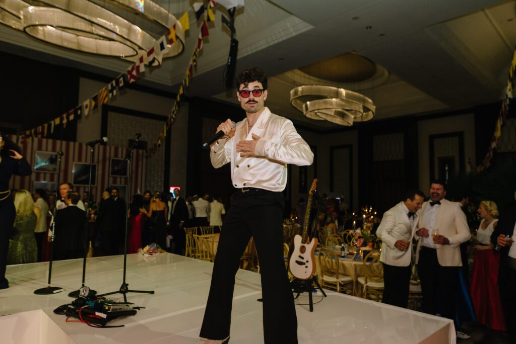 Nick from Nick and the Hits band performing at the Children's Fund 'By the Sea' gala