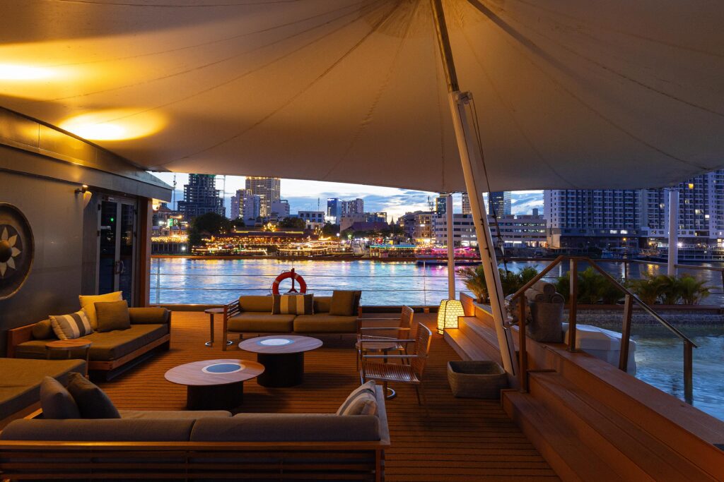 The observation deck — home to a patio lounge, plunge pool, fitness center, and bar – is the social heart of the ship. (photo courtesy of Aqua Expeditions)