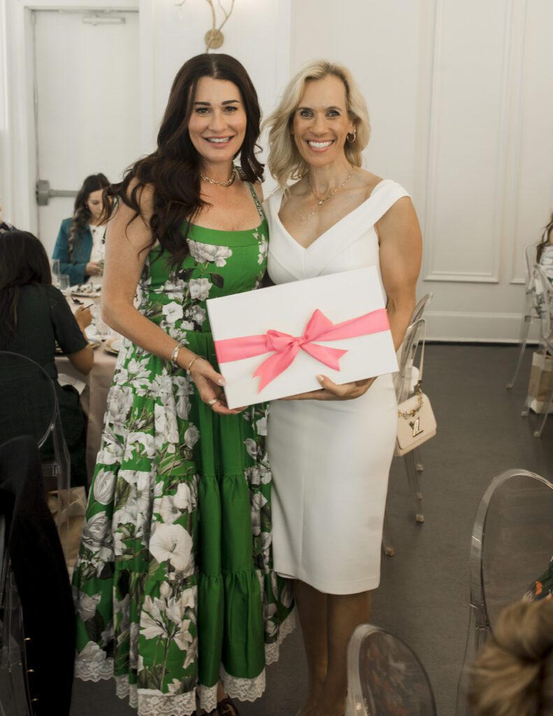Missy Herndon, left, and Michelle Little of Waste Management at the Women Empowering Women event at The Peach Orchard benefiting Interfaith Community Clinic. (Photo courtesy Porterhouse Portraits)