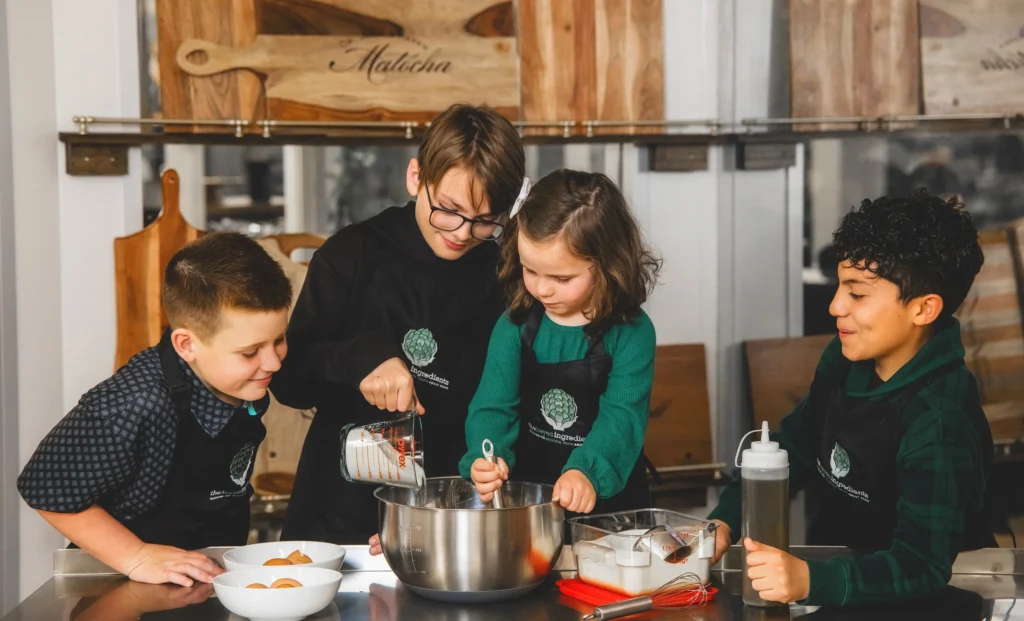 Children learn hands-on cooking skills during a class at The Keyes Ingredients. (Photo courtesy The Keyes Ingredients)