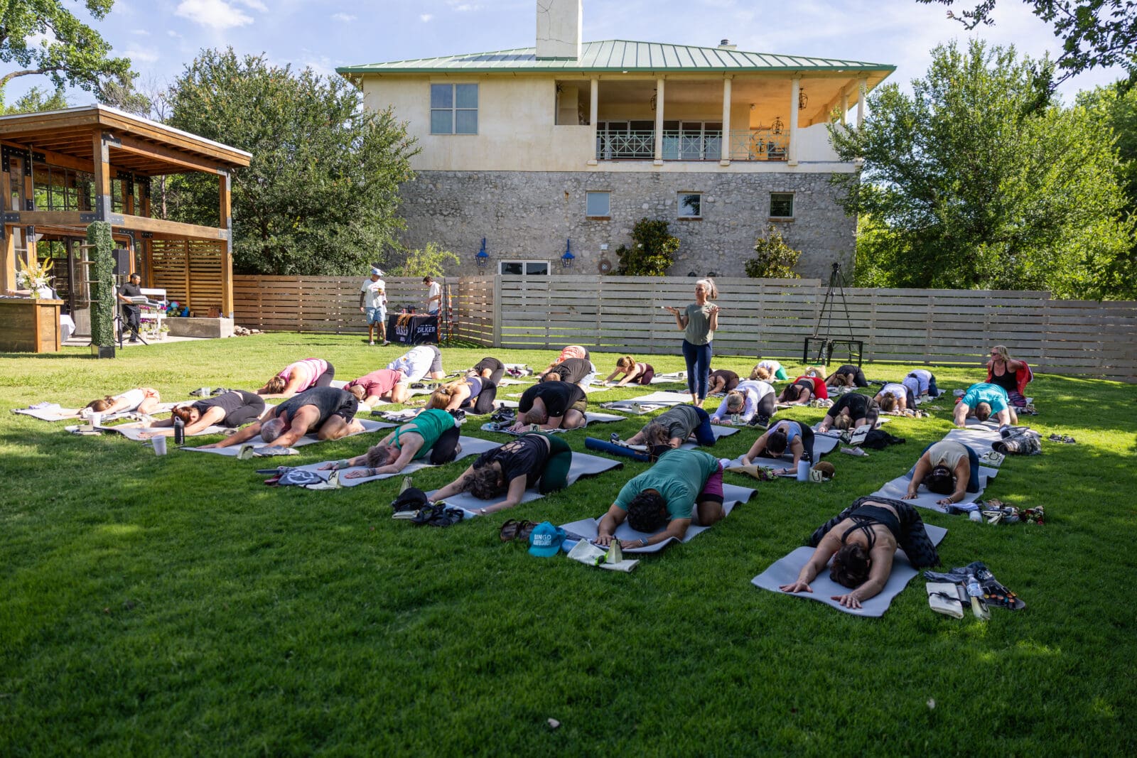Morning yoga on the lawn offered a relaxed start to one day of the Range Rover House experience. (Photo by Land Rover Fort Worth)