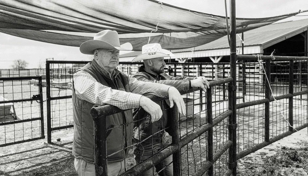 Rancher Larry Ludeke (left) with Simmons at the ranch. (Photo courtesy of Charolais)