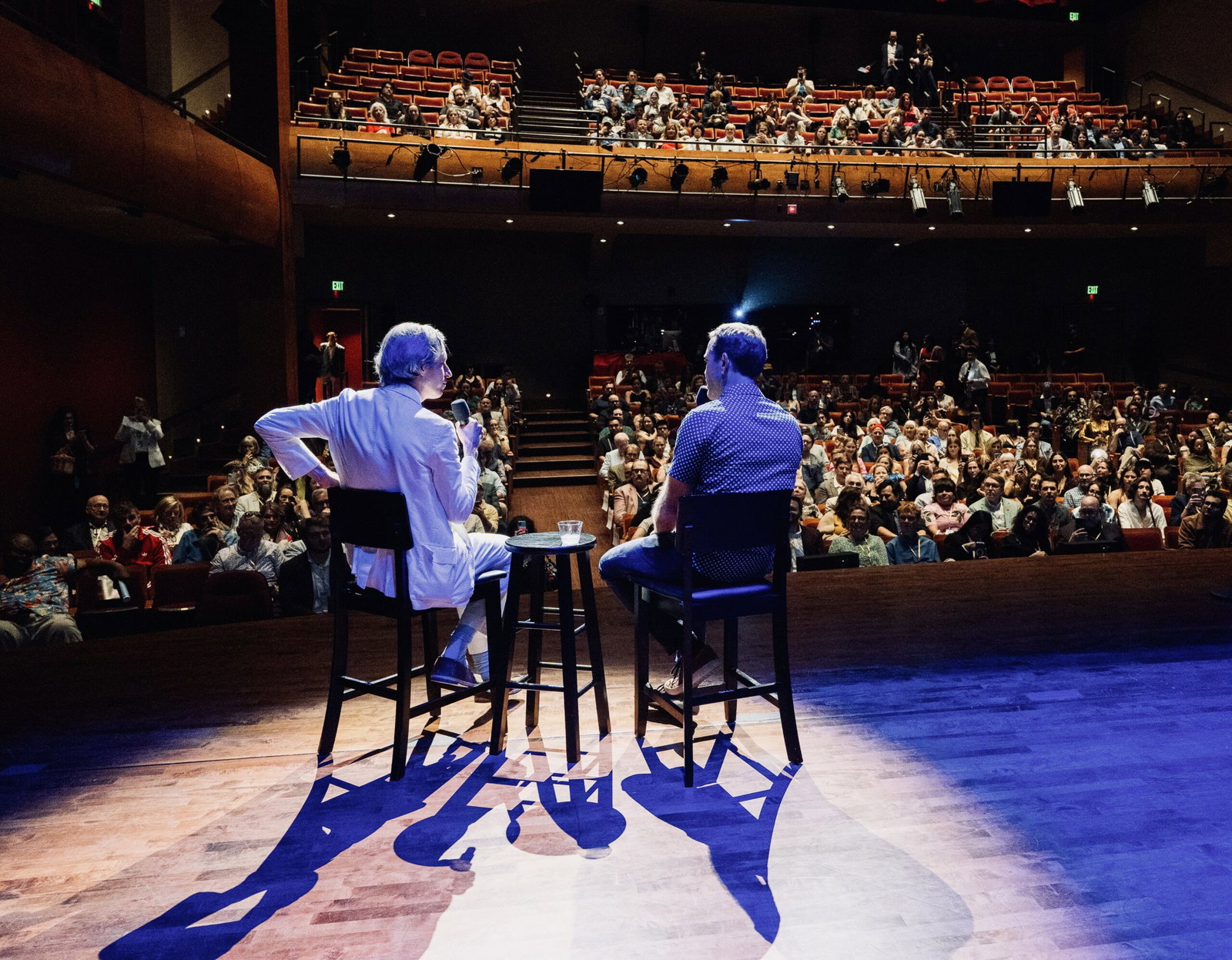 On the stage of Hobby Center's Zilkha Hall, Wes Anderson in conversation with moderator and friend MIke Maggart during the Homecoming evening to save Garden Oaks Theater. (Photo by Alan Nguyen)