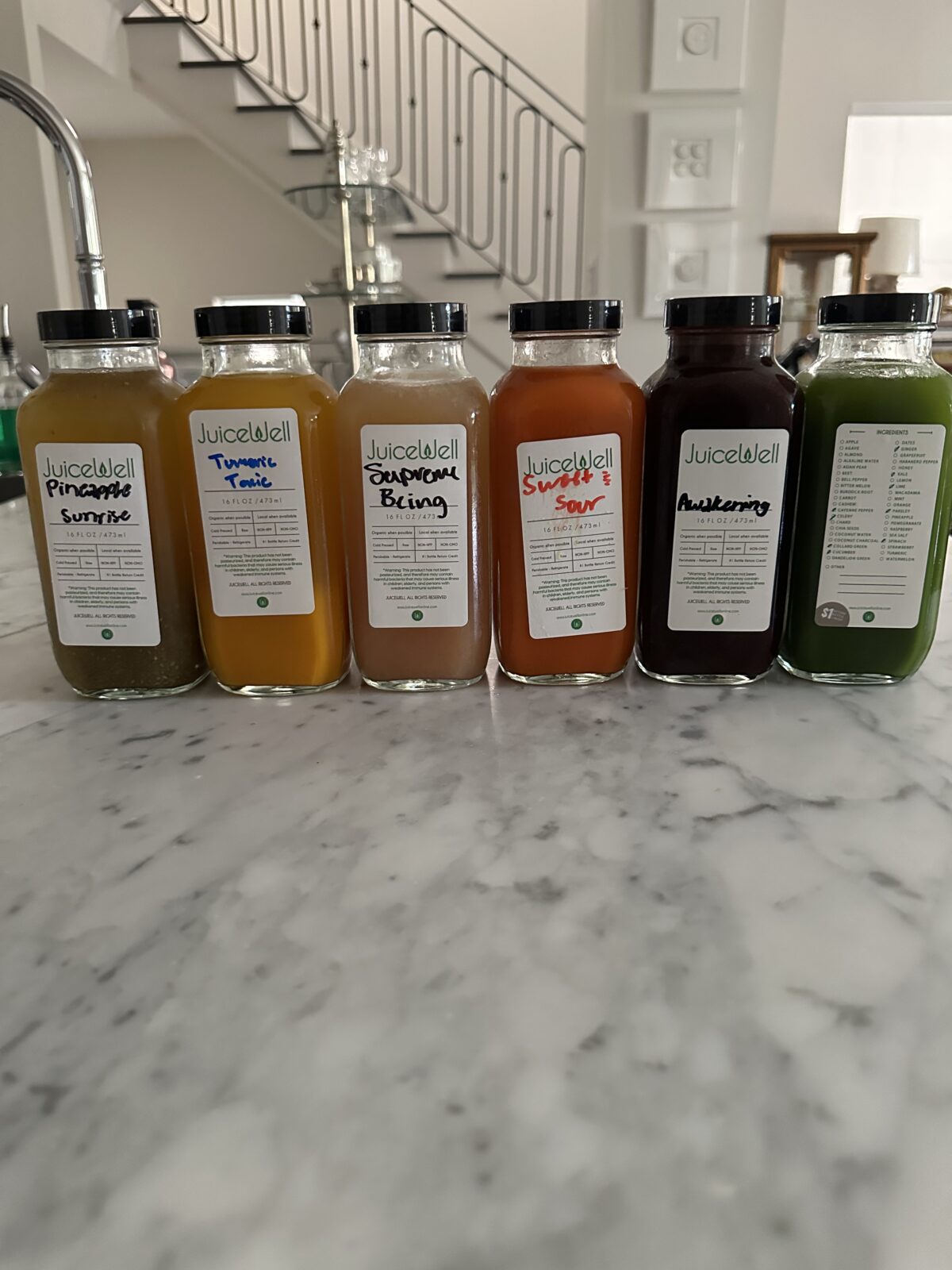 My six 16-ounce selections for a one-day fast-each bottle has the astounding equivalent of three pounds of fresh produce in liquid form—were very palatable. My selections included juices labeled: pineapple sunrise, turmeric tonic, supreme being, sweet and sour, awakening, and revival. Photo by Laurann Claridge