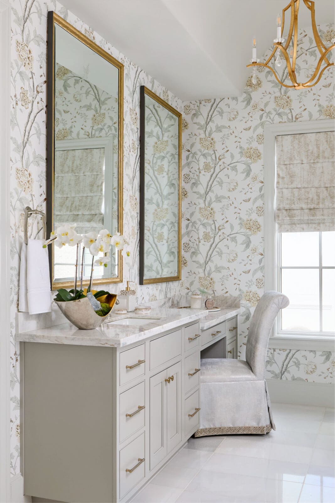 Antiques were reconsidered rather than simply relocated. Some were refinished, while others were reupholstered in crisp transitional textiles, allowing familiar silhouettes to assume an entirely new character.