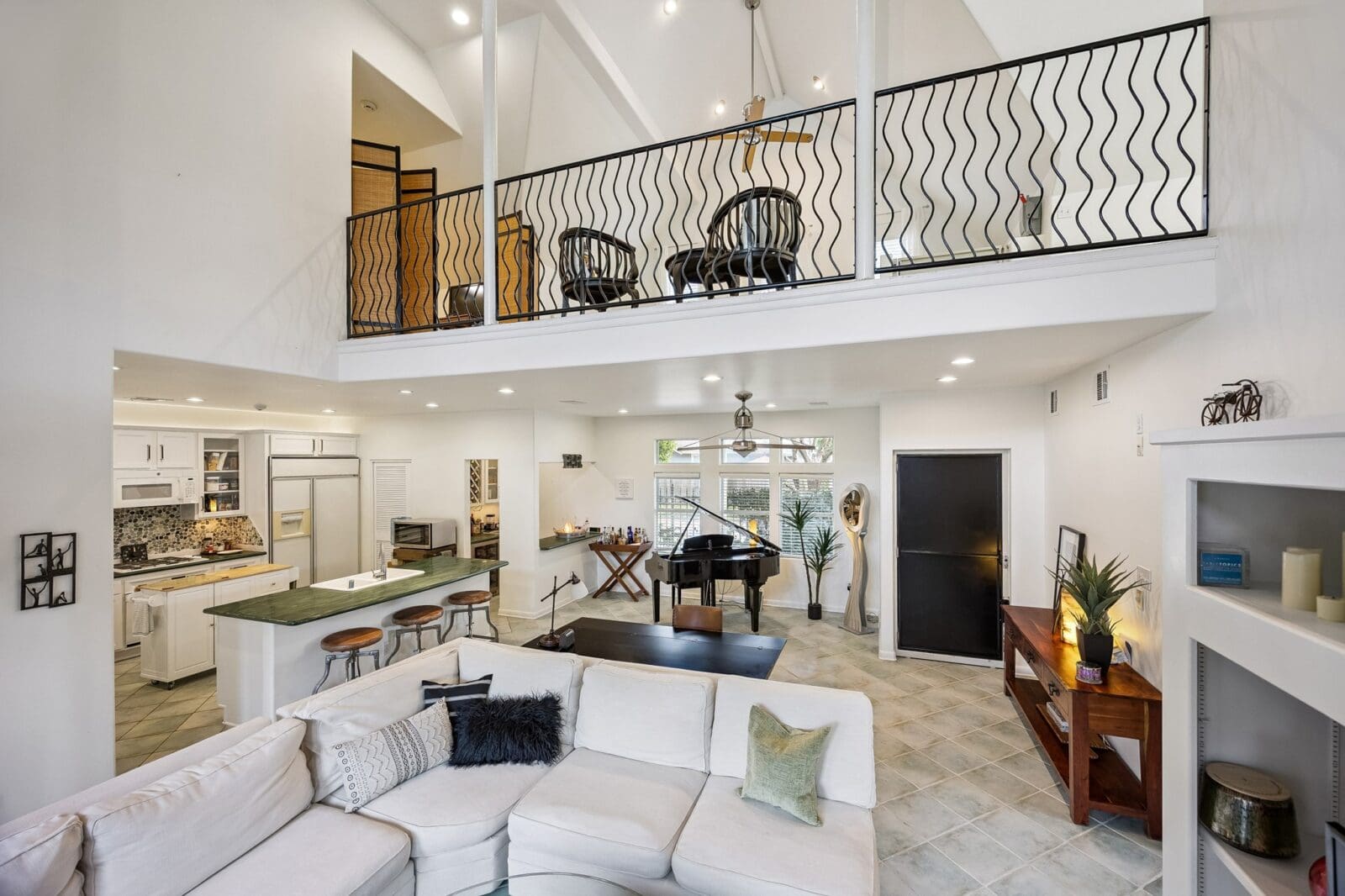 The open concept living area in the pool house which includes an elevator.  (Photo by TK Images for Martha Turner Sotheby's International Realty)