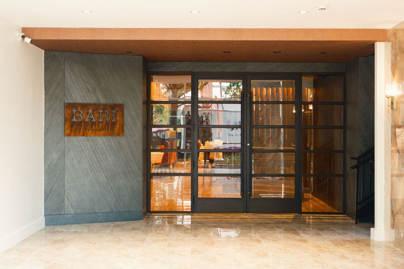 Bari's main entrance is at 24 Waterway Place.  Parking is available in the garage or on the street, and valet is available as well. (Photo courtesy of Bari)