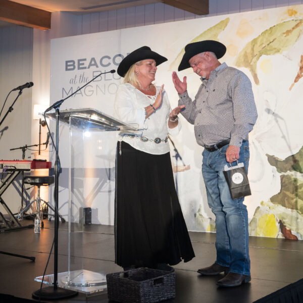 Executive Director Kelly Baughman recognized her husband Mark as Project Beacon’s volunteer of the year.
