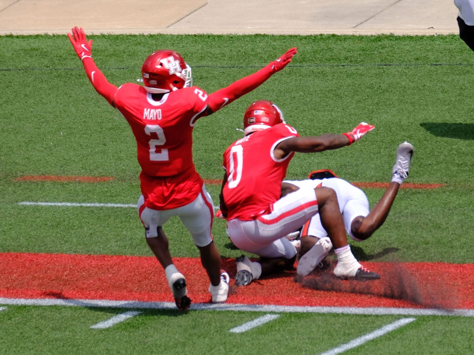 University of Houston defensive backs Jalen Mayo (No. 2) and Javion White (No. 0) are ball hawks. (Photo by F. Carter Smith)