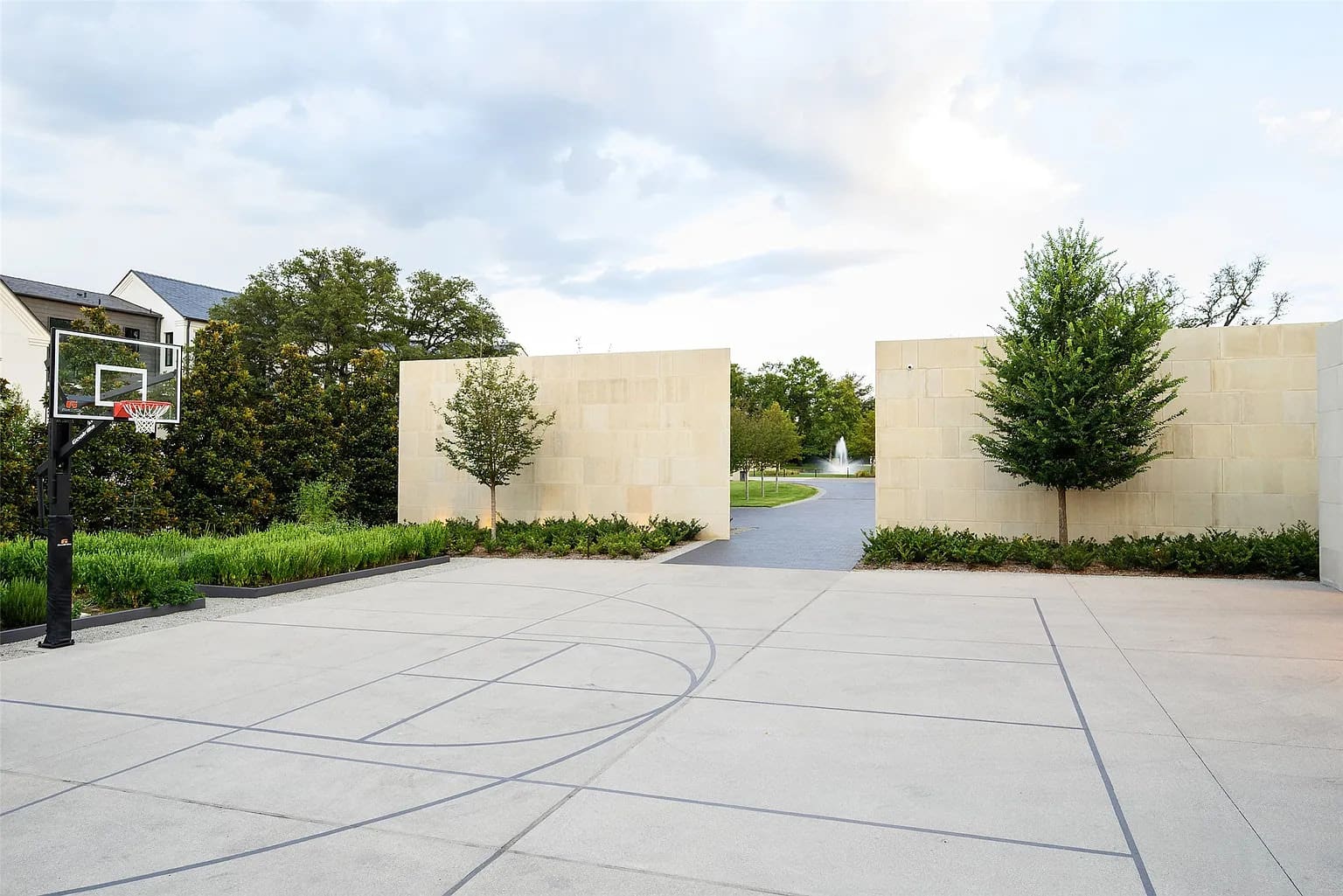 The home includes volleyball and sport courts. (Photo by Stephen Reed Photography)