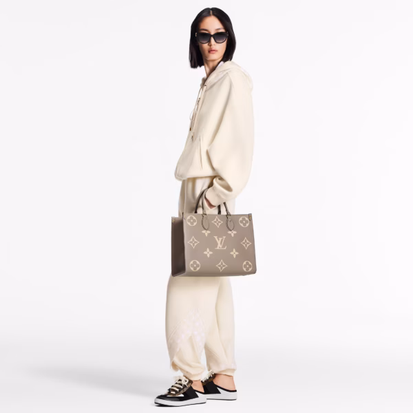 Louis Vuitton OnTheGo MM Bicolor Tote, $3,750.