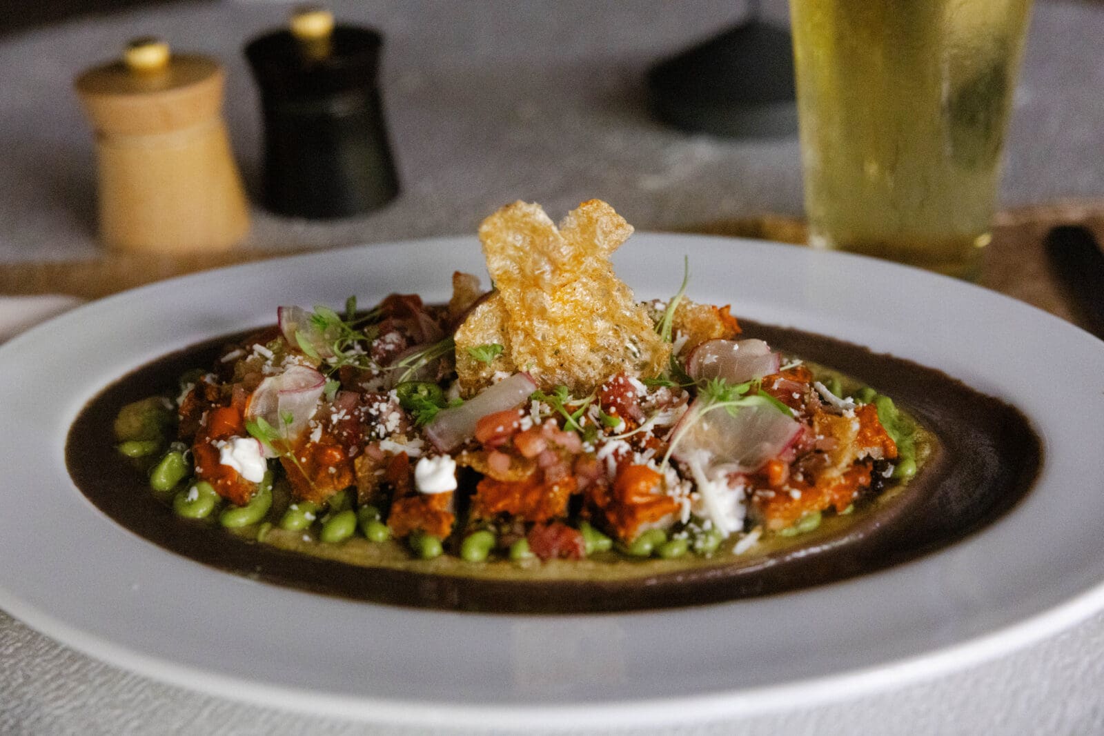 At TRIBUTE, the Iberico Pork Al Pastor is a refined interpretation of one of Mexico City's most beloved street foods.