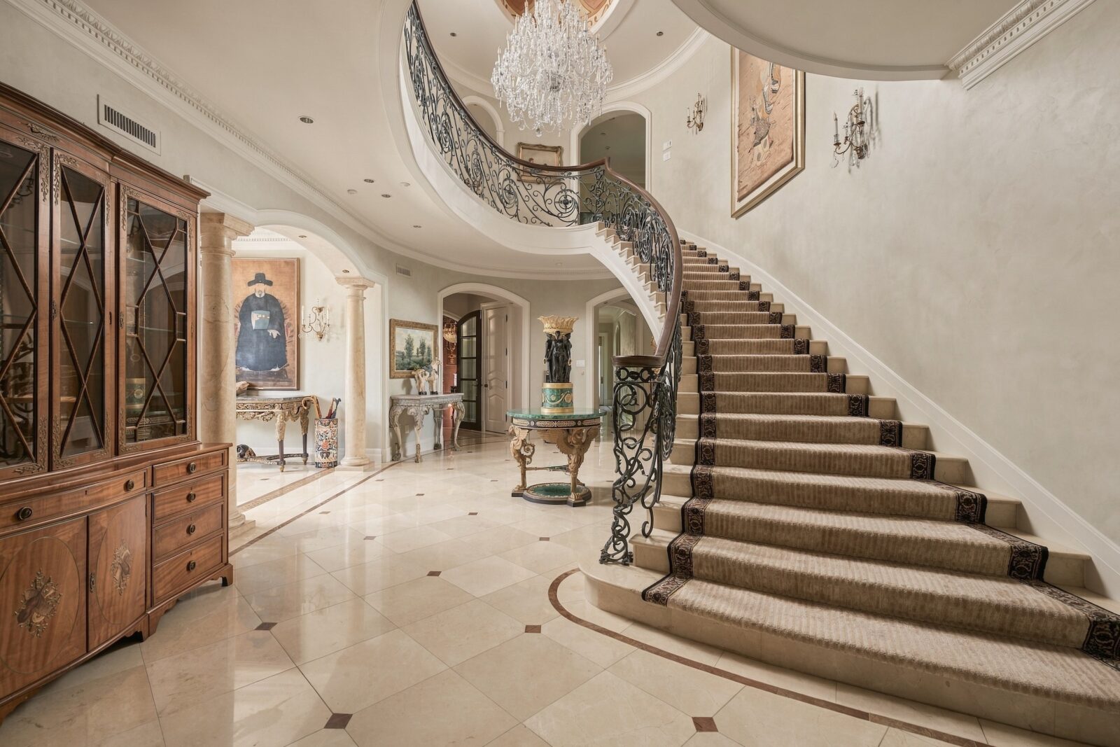One of two sweeping spiral staircases at 2115 River Oaks Boulevard (Photo by Aria Media)