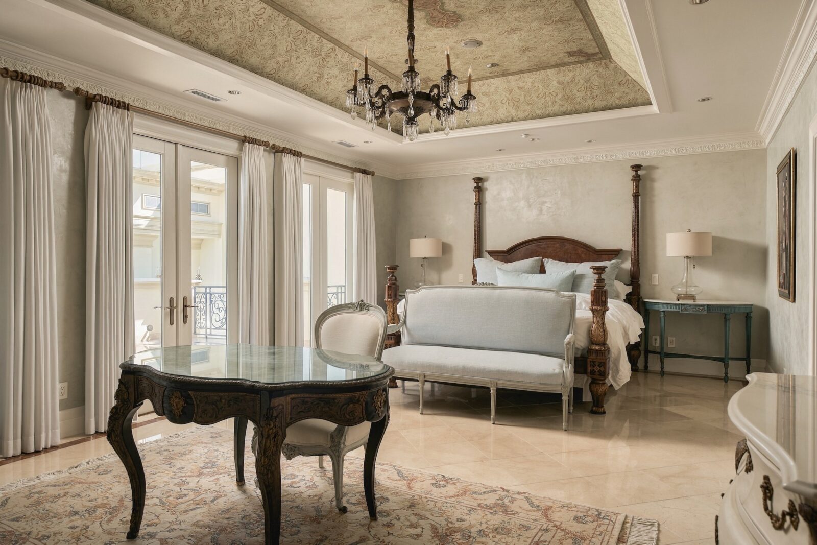 The primary bedroom with Venetian plaster (Photo by Aria Media)