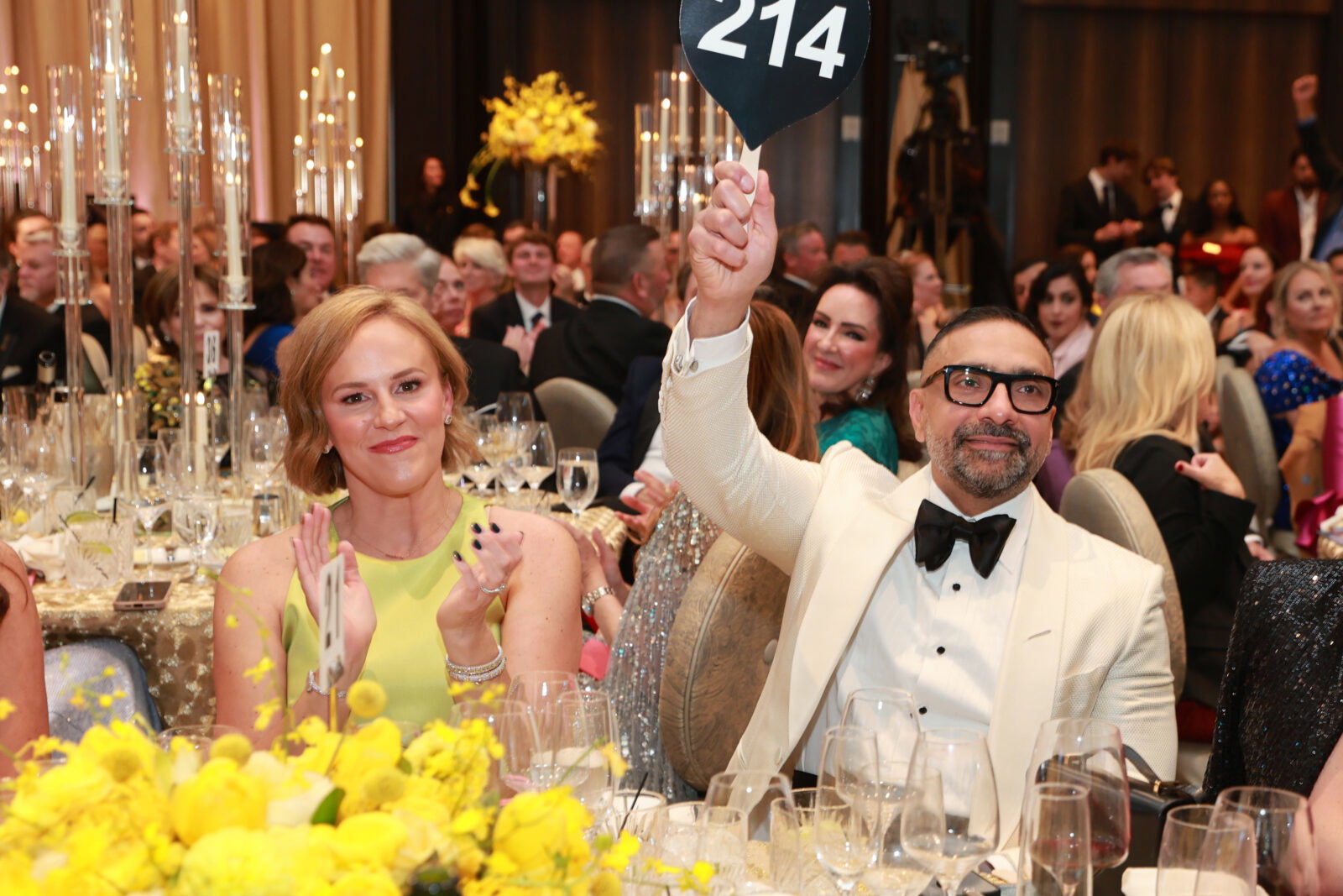 Erin & Mo Aziz donating 20 wheelchair accessible vans at Houston Children's Charity gala (Photo by Priscilla Dickson)