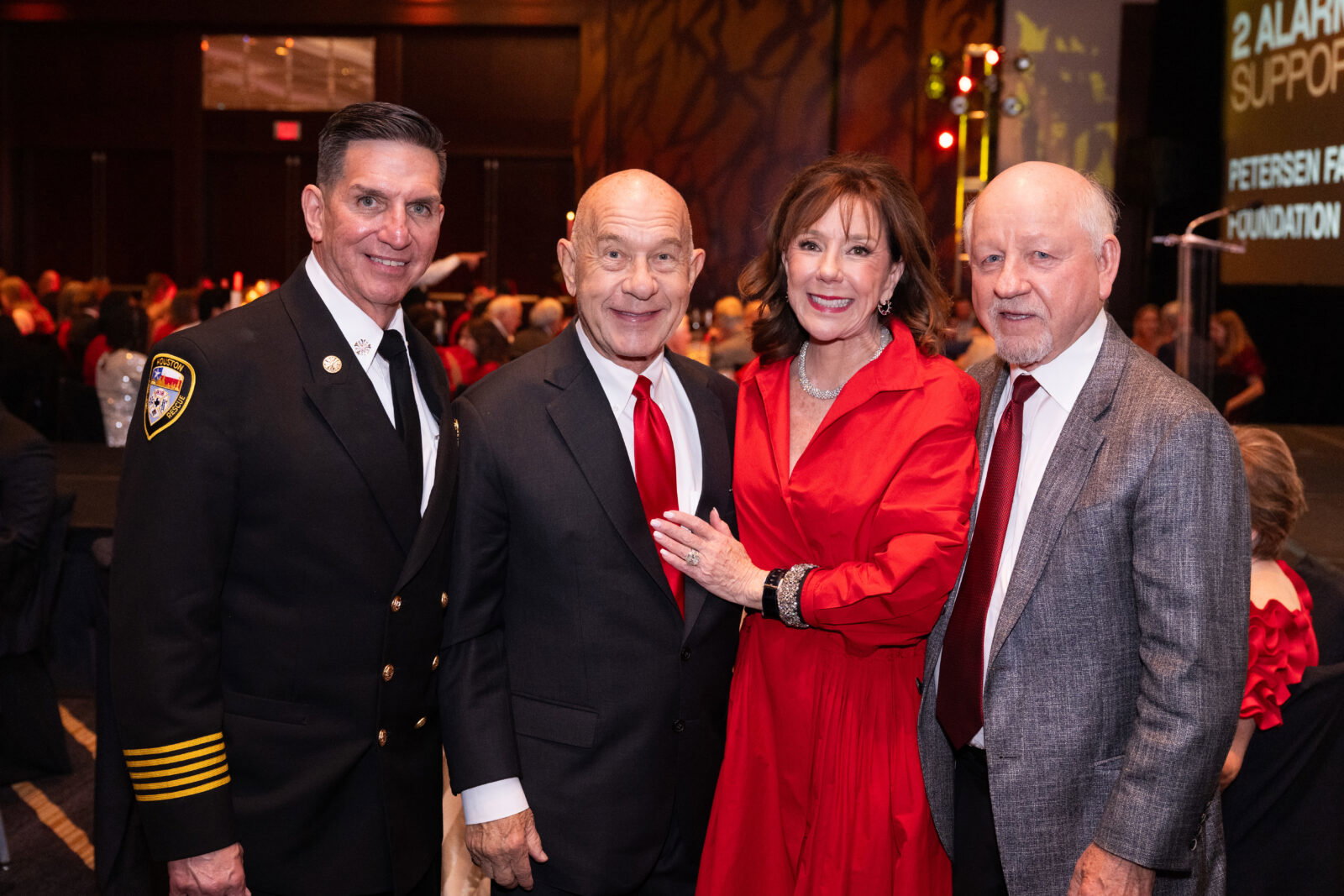 Fire Chief Thomas Muñoz, Houston Mayor John Whitmire, Elizabeth Stein and Troy Blakeney at the Red Hot Gala (Photo by Wilson Parish)