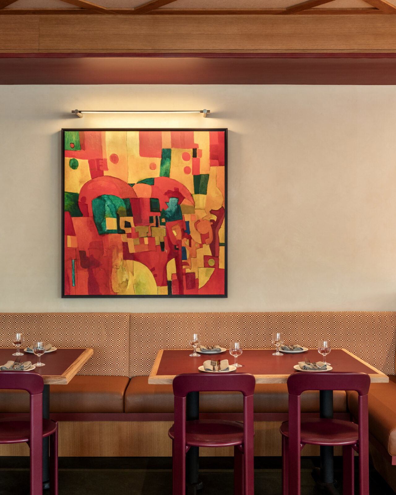 The painting that inspired the interior design of Angie's Pizza was created by Angelo Emiliani's grandfather, Maurice Schneps. Stationed in WWII in Paris, he made the acquaintance of luminaries like Chagall and Picasso who no doubt inspired him to paint and draw for the rest of his life. This beautiful piece is one that actually remains unfinished. (Photo by Chris Quit Nguyen)