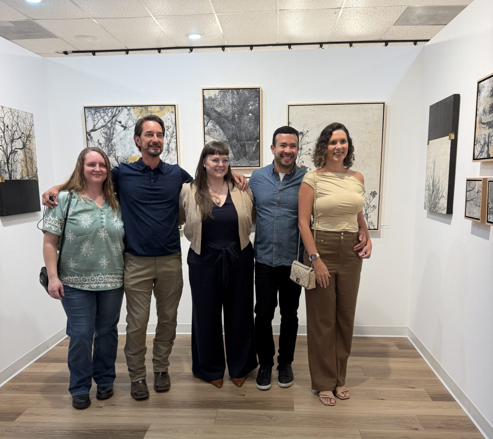 Shauna Martin (center) and artist friends celebrated at her solo show at Ardest Gallery on October 3. (Photo by Laura Landsbaum)