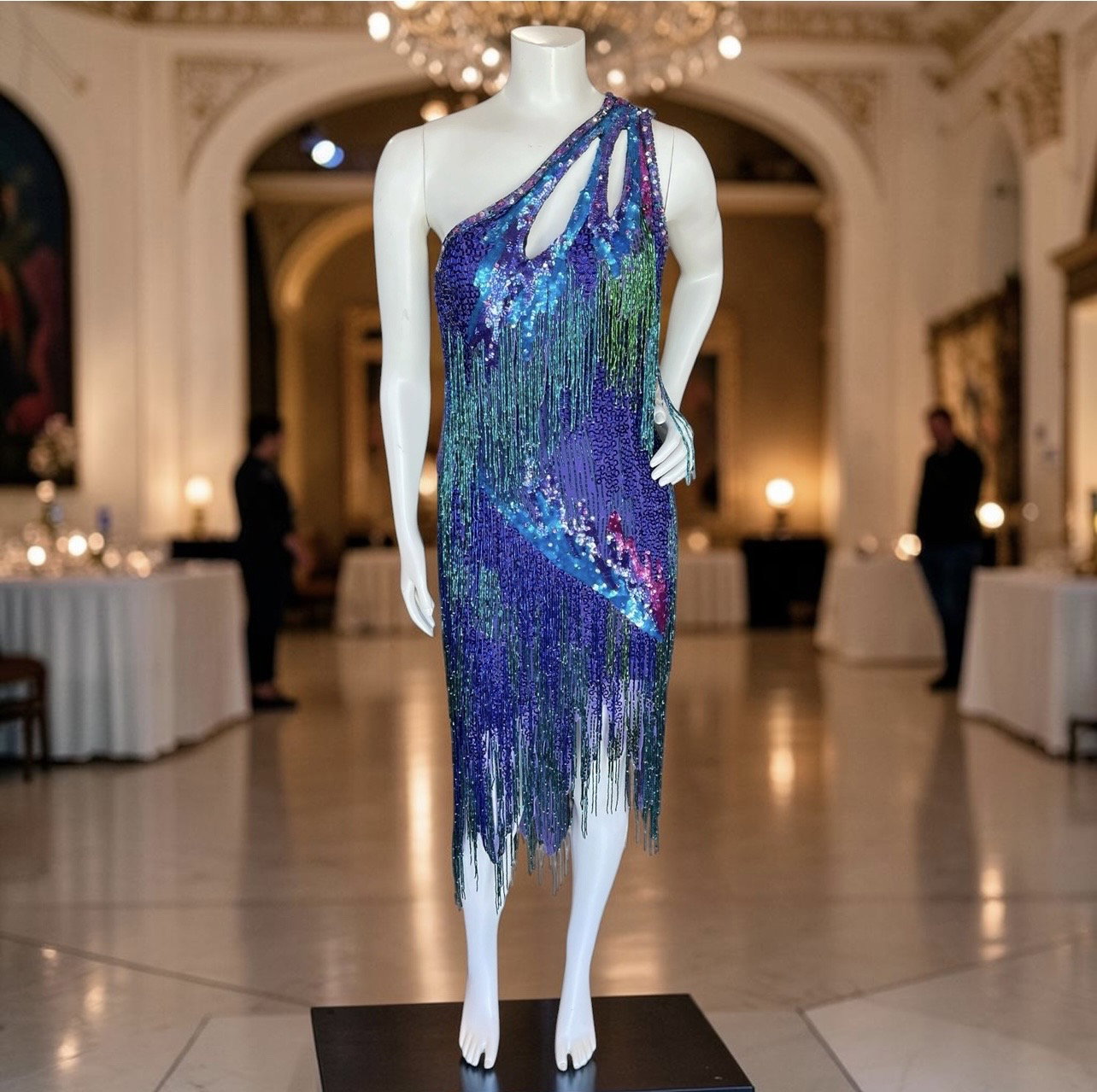 A colorful, sequined fringe dress showcases the statement-making fashion pieces that have become Studio 74 Vintage’s specialty. (Photo by Studio 74 Vintage)