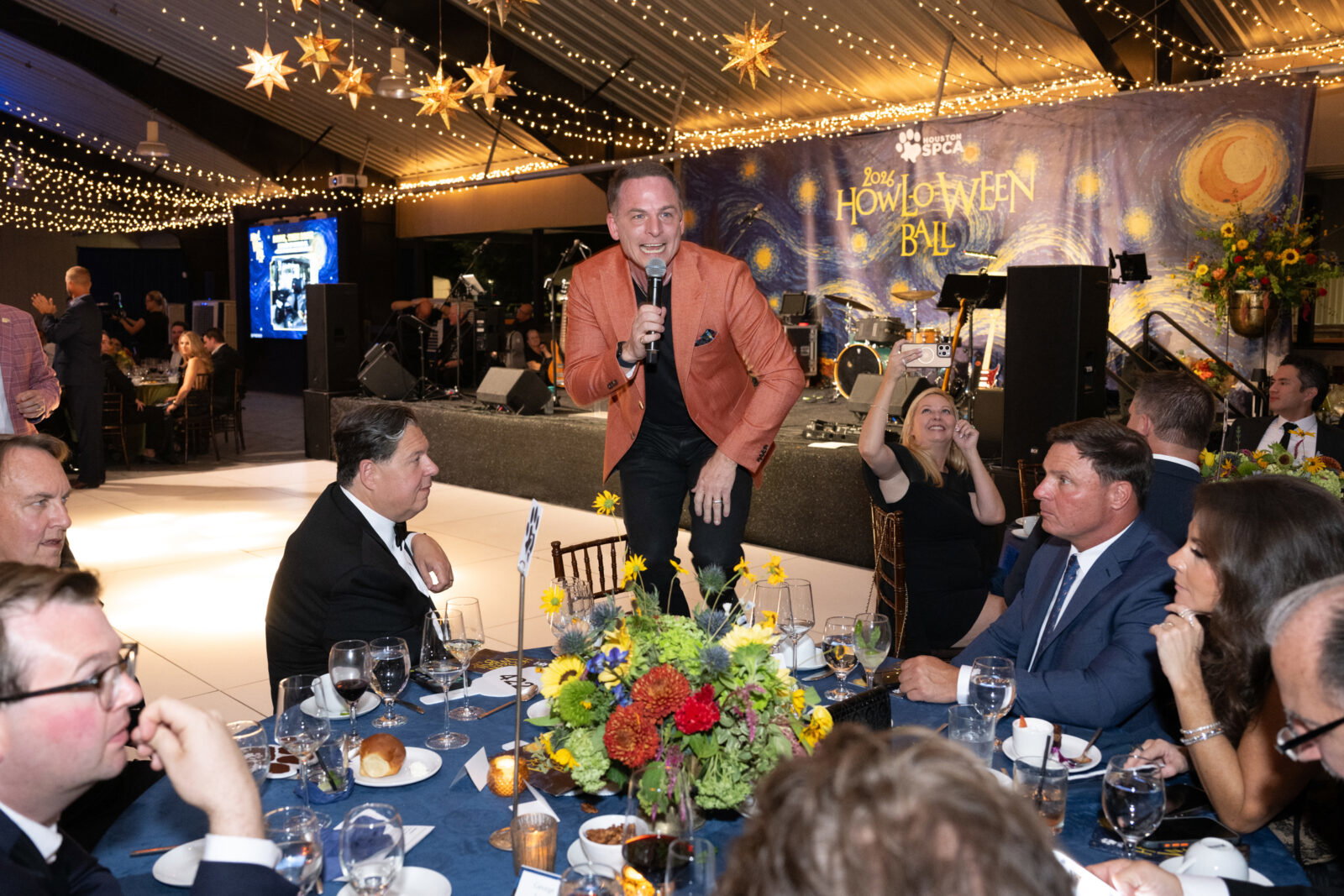 Auctioneer Johnny Bravo in action at Houston SPCA's 2026 Howl-O-Ween Ball (Photo by Wilson Parish)