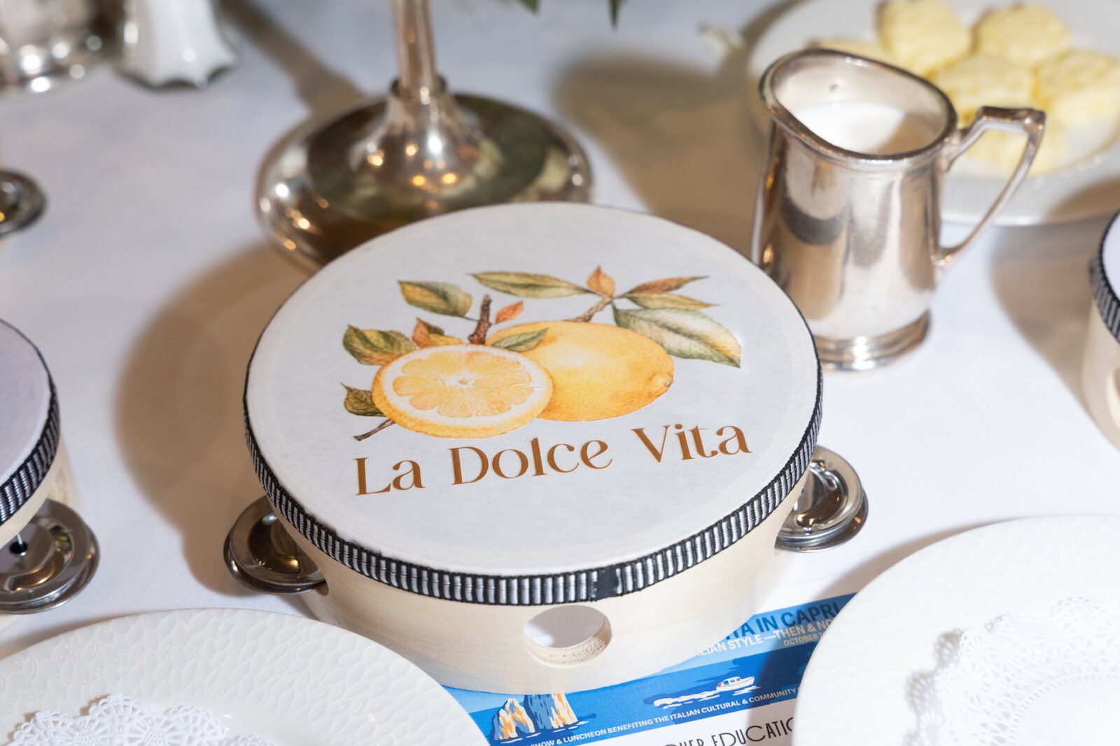 Tamborines fill tabletops at the 'La Dolce Vita' luncheon
