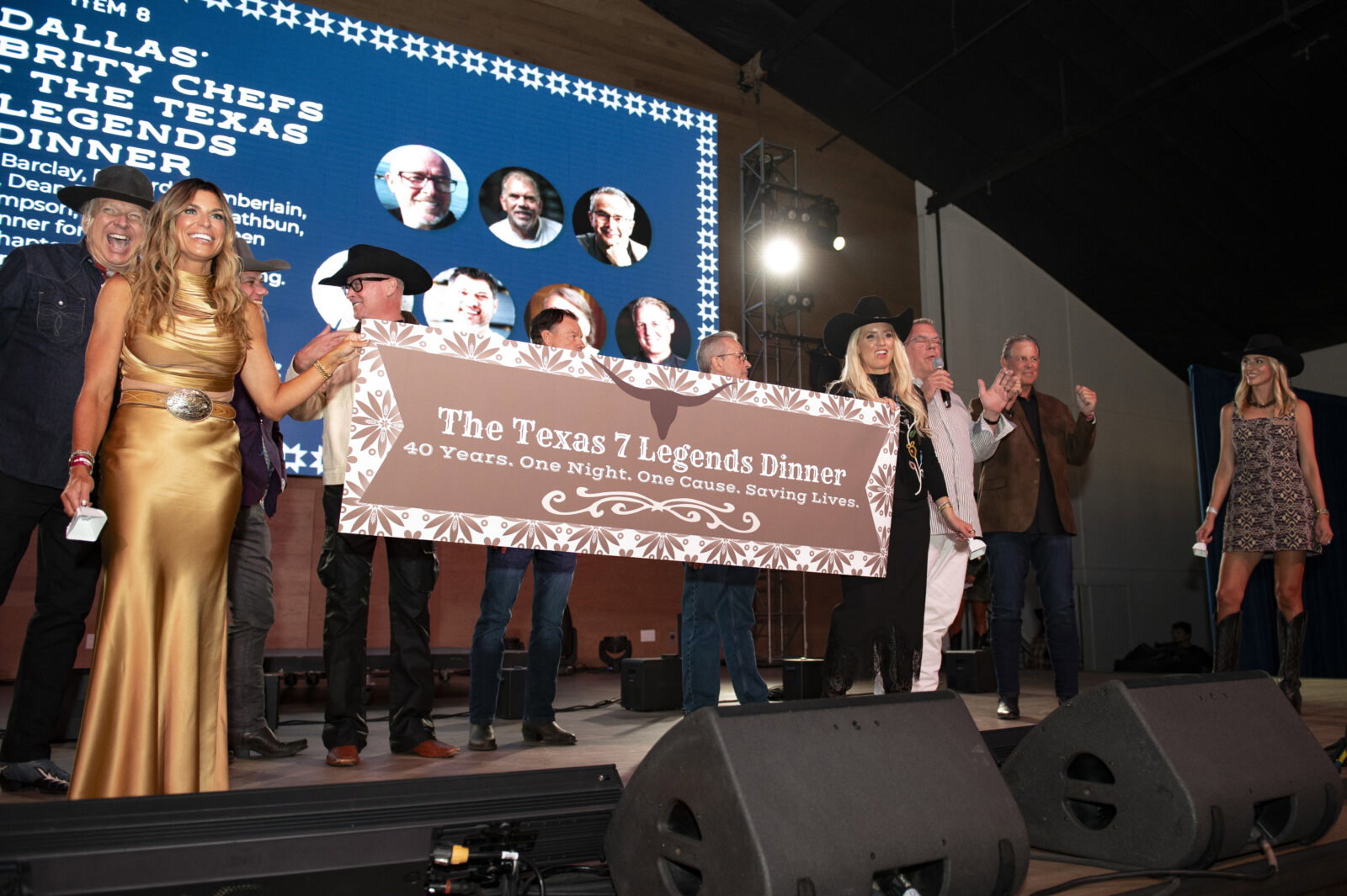 A highlight during a night of highlights, Dallas' seven all-star celebrity chefs (Nick Barclay, Richard Chamberlain, Eric Dreyer, Dean Fearing, Kent Rathbun, Gerard Thompson, and David Holben) ascended the stage in celebration of 40 years of coming together to offer the ultimate dinner party for 20, prepared by the dynamos themselves. (Photo by Tamytha Cameron Photography)