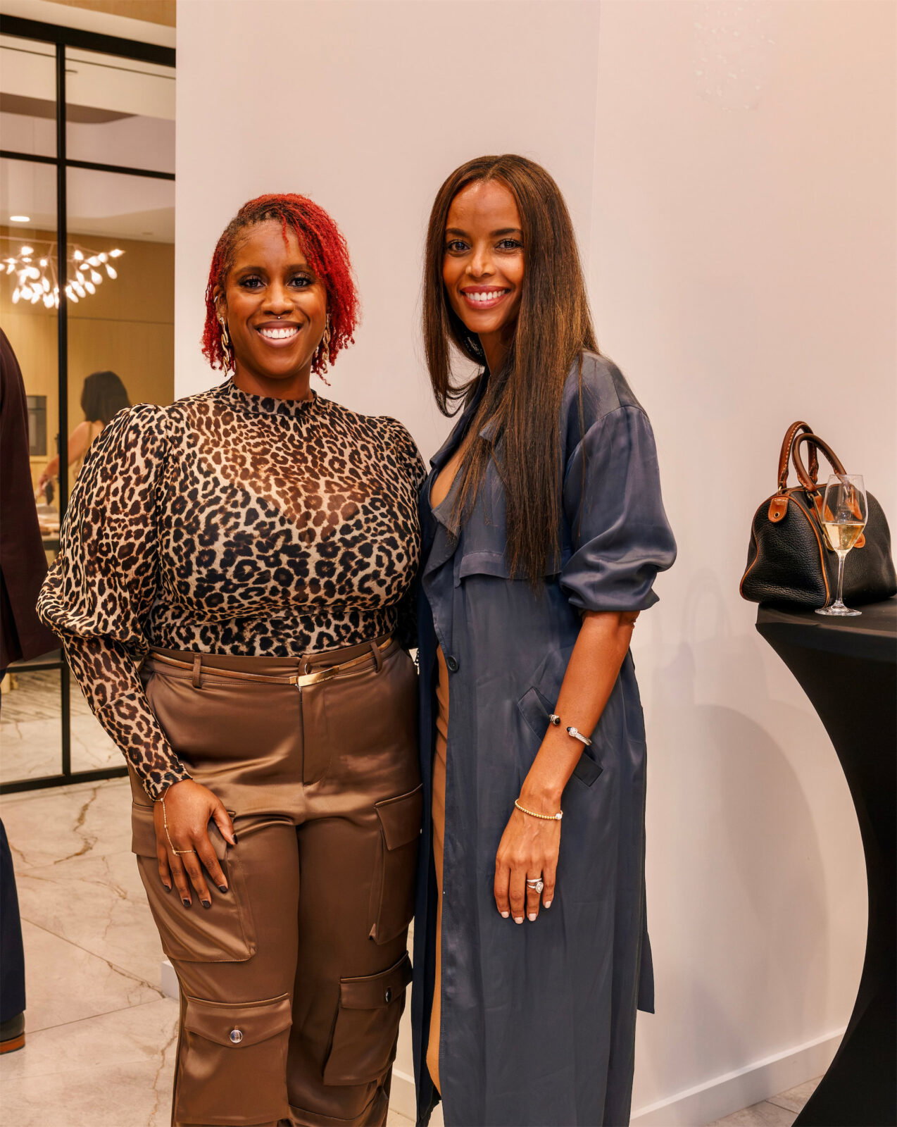 Rhonnika Clifton, Azeb Kingsmore at PaperCity x BSH October Issue Launch Party (Photo by Kolton King )
