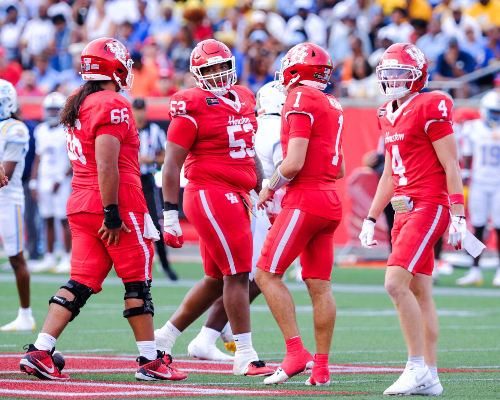 University of Houston offensive lineman McKenzie Agnello (No. 66) and Ron McLain (No. 53) help this high-powered offense go.(Photo by F. Carter Smith)